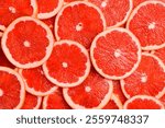 Grapefruit slices close-up. Top view citrus fruits.