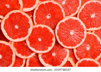 Grapefruit slices close-up. Top view citrus fruits.