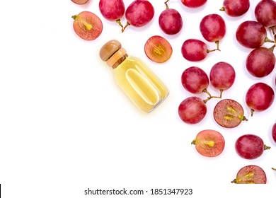 Grapes seed oil isolated on white background. Top view. Flat lay.