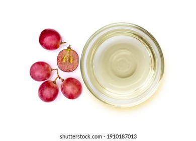 Grapes seed oil isolated on white background. Top view. Flat lay.