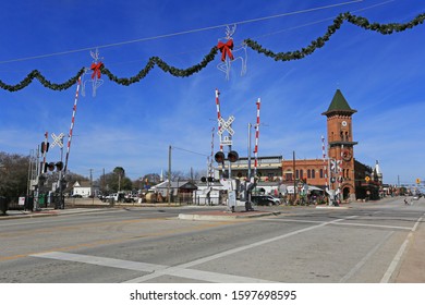 GRAPEVINE, CHRISTMAS CAPITOL OF TEXAS, DEC 24, 2019: Unique shopping experience of Main Street in Historic Downtown Grapevine; holiday decorations and Christmas lights and charming local gift stores.