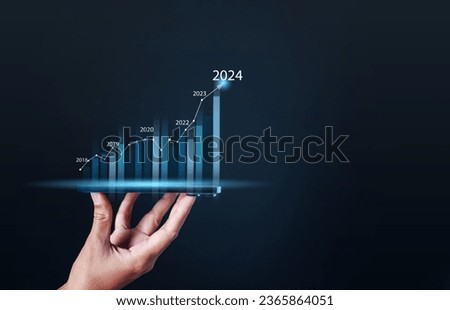 graph, business, chart, growth, success, analysis, investment, diagram, finance, marketing. close up hand has bar chart summary of years investment, that's diagram inversely proportional bar.