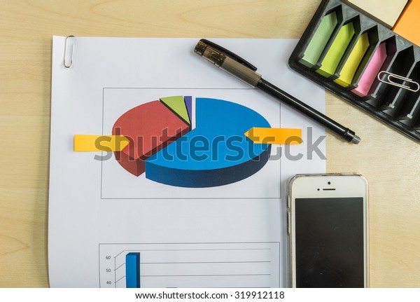 Graph
of market share with black pen in business
concept