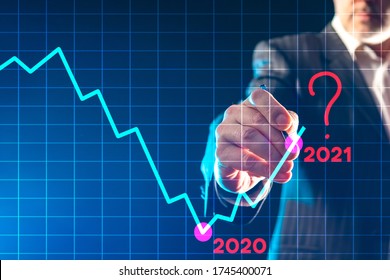 Graph Symbolizes The Unknown. Question Is Next To Number 2021. Man Draws A Graph On Glass. Lack Of Forecasts For Next Year. Concept - Uncertainty Of Next Year. Graph Shows State Of Global Economy