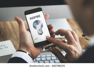 Graphic of creative ideas digital technology light bulb on mobile phone