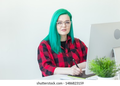 Graphic Designer, Animator And Illustrator Concept - Young Woman With Green Hair Working At The Laptop