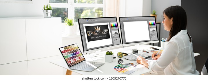Graphic Designer Artist Working On Multiple Computer Screens - Shutterstock ID 1805270770