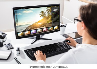 Graphic Designer Editing Photo On Desktop Computer