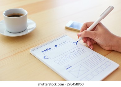 Graphic Designer Sketching Web Design