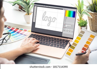 Graphic designer woman working on a laptop - Shutterstock ID 1817114390