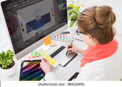 Graphic designer at work. Color swatch samples. - Shutterstock ID 384126496