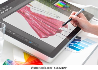 Graphic designer at work. Color swatch samples. - Powered by Shutterstock