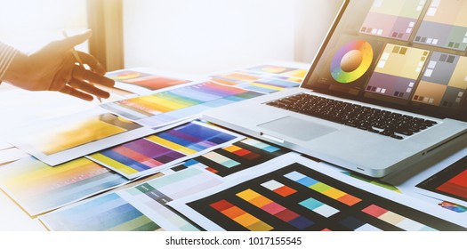 Graphic designer at work Creativity renovation and technology concept Color swatch samples for selection coloring studio - Powered by Shutterstock