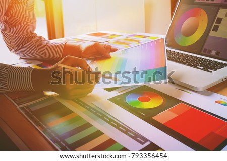 Graphic designer at work Creativity renovation and technology concept  Color swatch samples for selection coloring studio