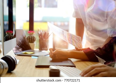 Graphic Designer working with interactive pen display, Young creative using digital Drawing tablet and Pen on a computer. - Powered by Shutterstock