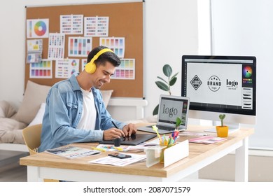 Graphic designer working in office - Powered by Shutterstock