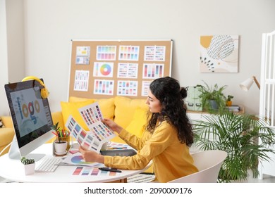 Graphic Designer Working In Office