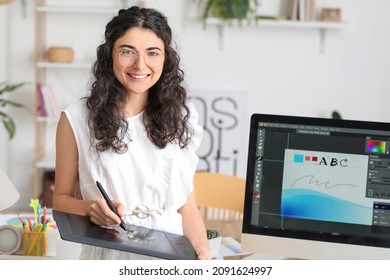 Graphic designer working in office - Shutterstock ID 2091624997