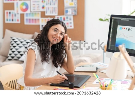 Graphic designer working in office