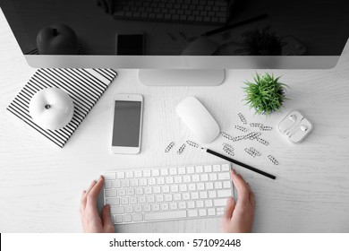 Graphic designer working on computer, top view