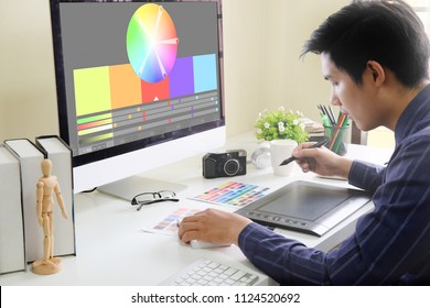 Graphic designer working on digital tablet Creative workplace. - Shutterstock ID 1124520692