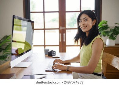 Graphic designer working on digital tablet and computer. Designer Asian Woman artist drawing on graphic tablet  Artist Creative Designer sketch graphic drawing creative. - Powered by Shutterstock