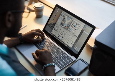 Graphic Designer Working With Program On Laptop