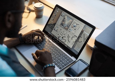 Graphic Designer Working With Program On Laptop