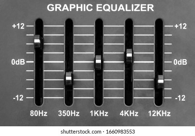 Graphic equalizer on sound mixer. Close up.