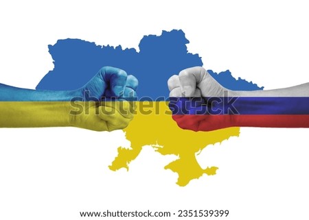 A graphic photo of two fists, one painted in the colors of the Ukrainian flag and the other in the colors of the Russian flag, colliding in front of a map of Ukraine. The photo conveys a sense of conf
