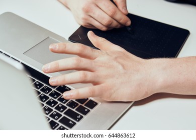 Graphic tablet, work behind a tablet and technologies, new technologies, a tablet and a laptop, work and creativity