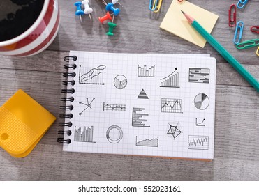 Graphical analysis concept drawn on a notepad placed on a desk
