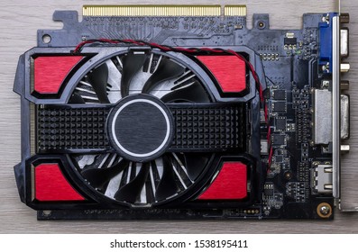 graphics card with red cooler close up - Shutterstock ID 1538195411