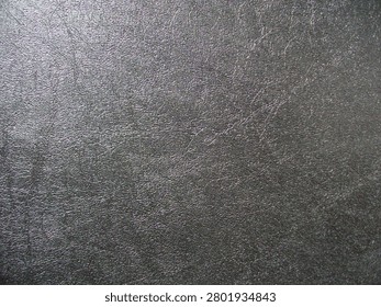 Graphite background and paper texture, macro image.