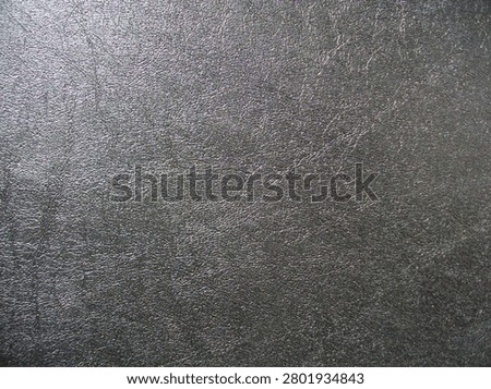 Graphite background and paper texture, macro image.
