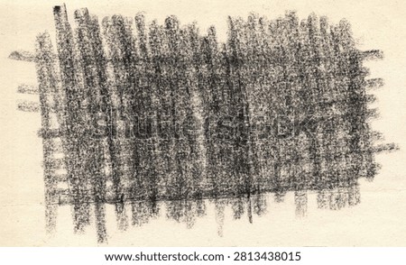 Graphite texture with layered intersecting strokes on aged paper