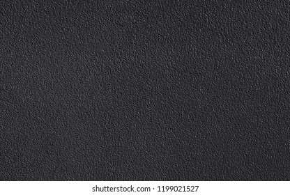 Graphite textured surface with reflections. Beautiful rich background in black colors and shades
