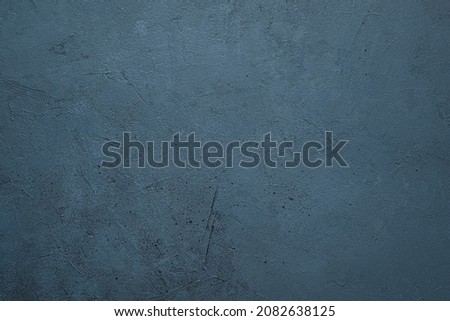 Graphite-colored concrete background. Top view, horizontal, copy space.