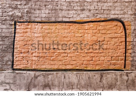 graphitti rectangle on a brick wall moscow