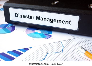 Graphs And File Folder With Label  Disaster Management. Business Concept.