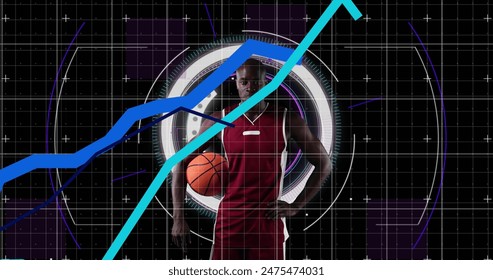 Graphs moving over portrait of african american male basketball player against round scanner. sports and technology concept - Powered by Shutterstock