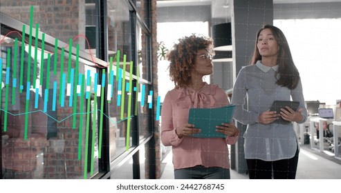 Graphs processing data over diverse casual businesswomen talking in office corridor. Casual business, data, digital interface, connection, office and communication digitally generated image. - Powered by Shutterstock