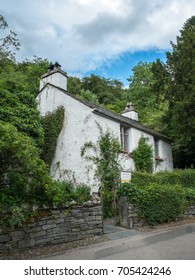 Grasmere, Lake District, UK - June 2017: Dove Cottage - Picturesque Home Of The Poet William Wordsworth.