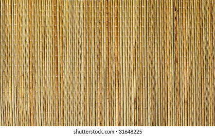 Grass Mat Background In Tan And Brown Tones