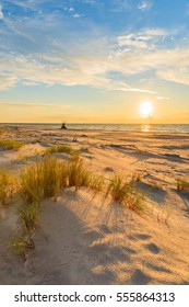 Grass On Sand Dune And Sunset Over Leba Beach, Baltic Sea, Poland