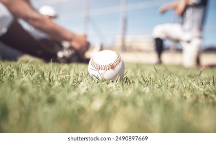 Grass, softball and ball on field for game, competition and pitch for training of team. Sport people warm up, baseball and lawn for practice and hobby on floor with equipment in Florida stadium - Powered by Shutterstock