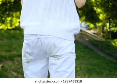 Grass Stains Of On White Pants. Daily Life Dirty Stain For Wash And Clean Concept. High Quality Photo
