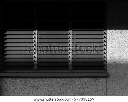 Similar – Two windows with closed shutters