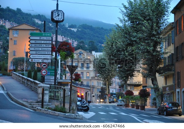 Grasse, Provence, France - Sept. 6,\
2010: View of the city in the evening light. Grasse - small city\
founded in the 11th century, perfume capital of\
France