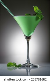 Grasshopper cocktail with mint on gradient background 